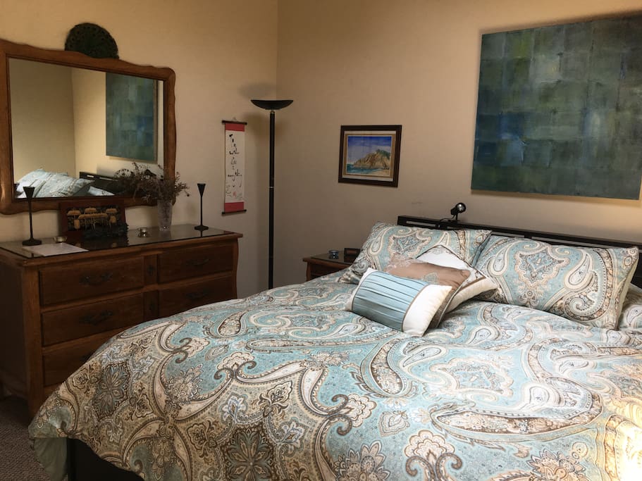Quiet ample sized room with comfortable queen bed & skylight.