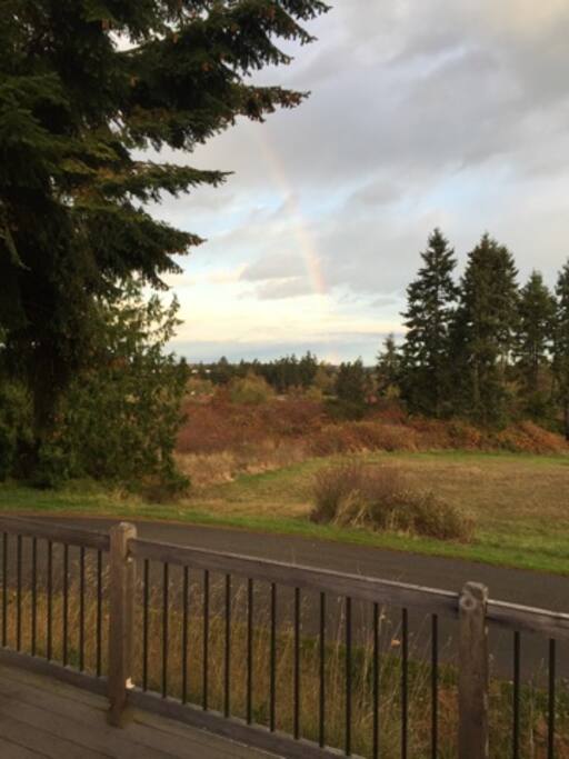 The field seen from the front deck provides great privacy.Enjoy a rainbow from the front deck!