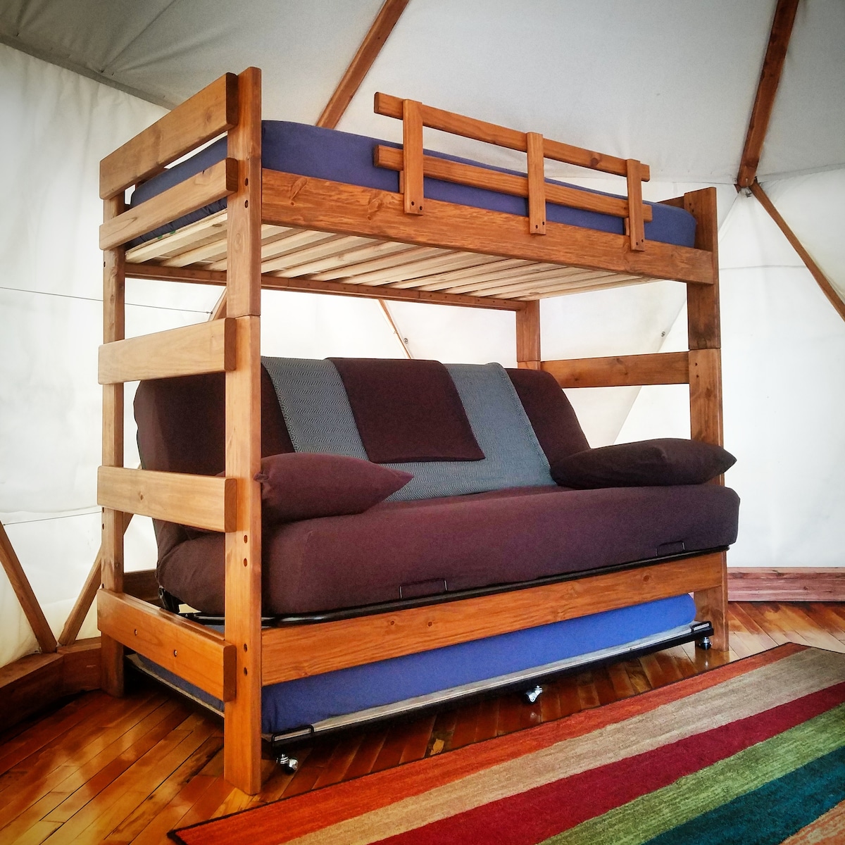 We've upgraded the furniture! Solid wood beds and new mattresses!