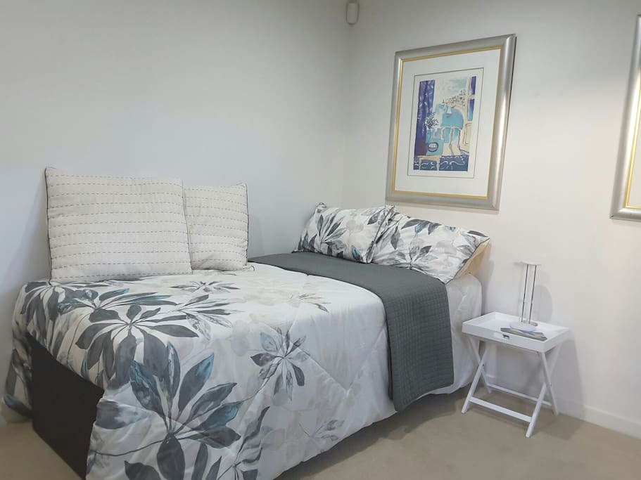 Bedroom set up with King Single bed