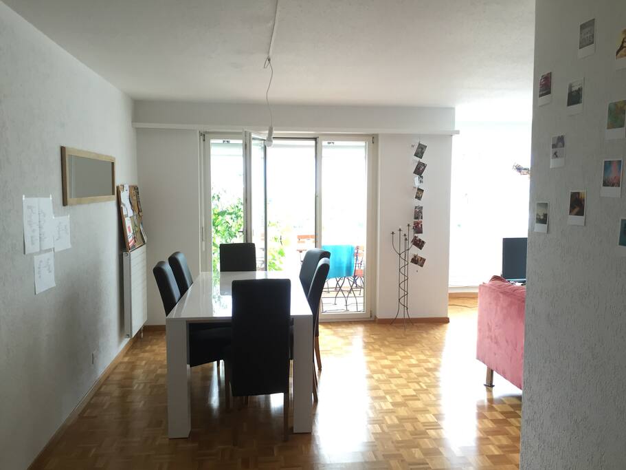 Livingroom with diningtable and Balcony