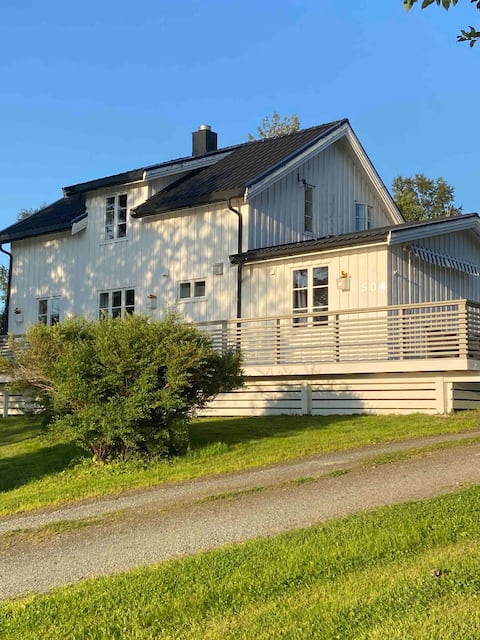 House close to the ferry and the sea