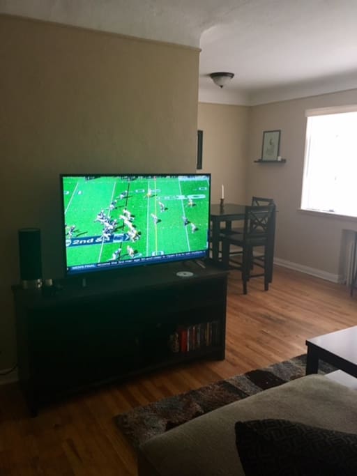 50" tv with access to local channels, HBO, Hulu, and Netflix