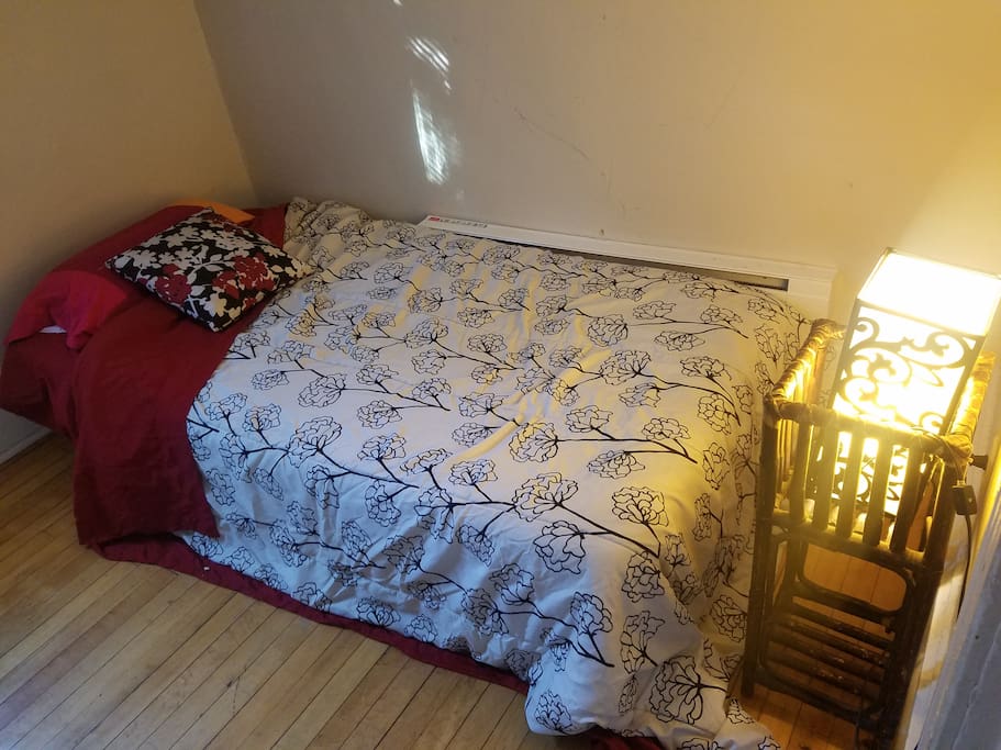 This is the smaller room that fits a queen bed snugly!