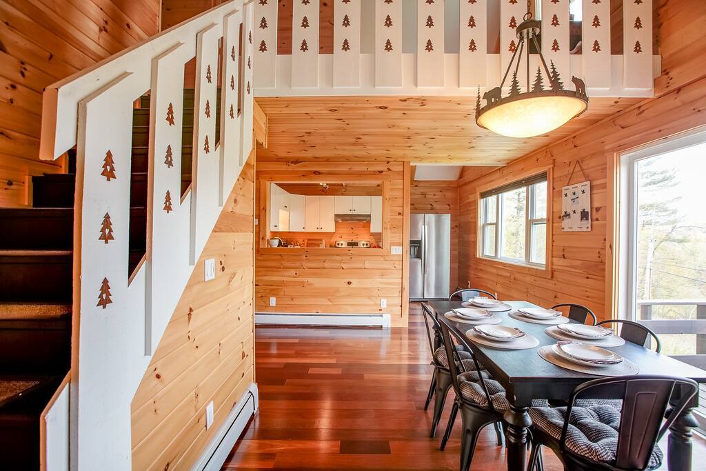 Kitchen and dining area, with view of the upstairs office loft.