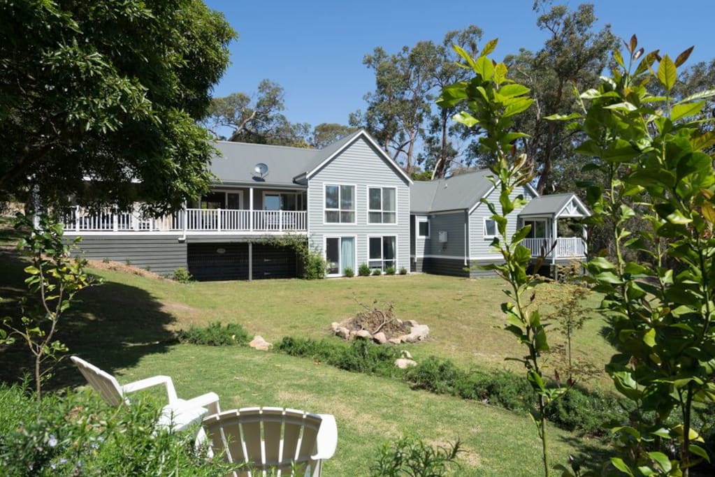 Relax and enjoy a half acre of gardens