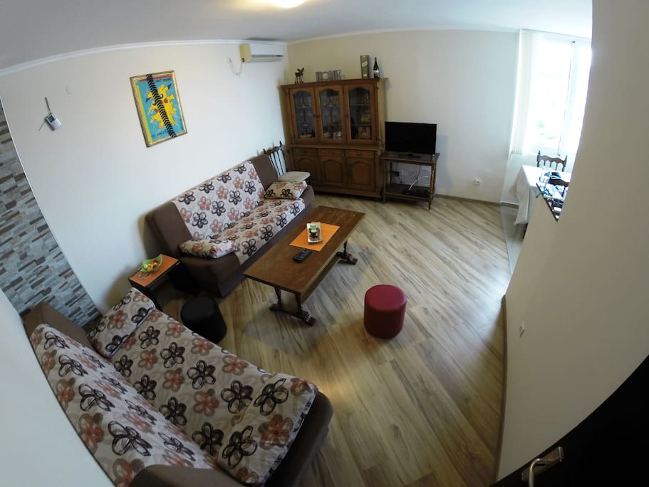Living room has 2 couches that can be turned into 2 double beds.