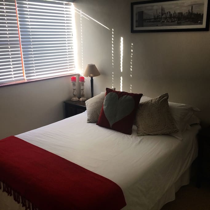 Comfortable double bed, fan and heating available in room.