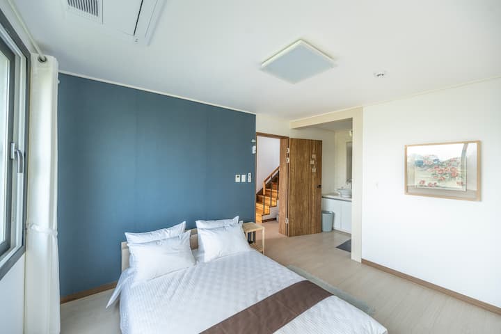 First-floor room (low-floor beds are exchanged for regular queen-sized wooden beds)