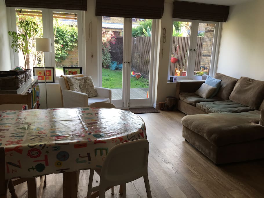 Living room with french doors leading onto decking