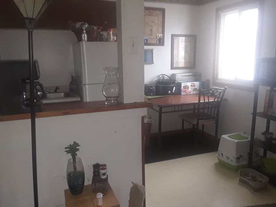kitchen with coffeepot, crockpot, new dishes and will provide some food/beverages