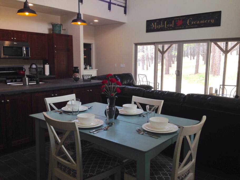 Dining Table (extends for larger groups) with 6 total chairs.