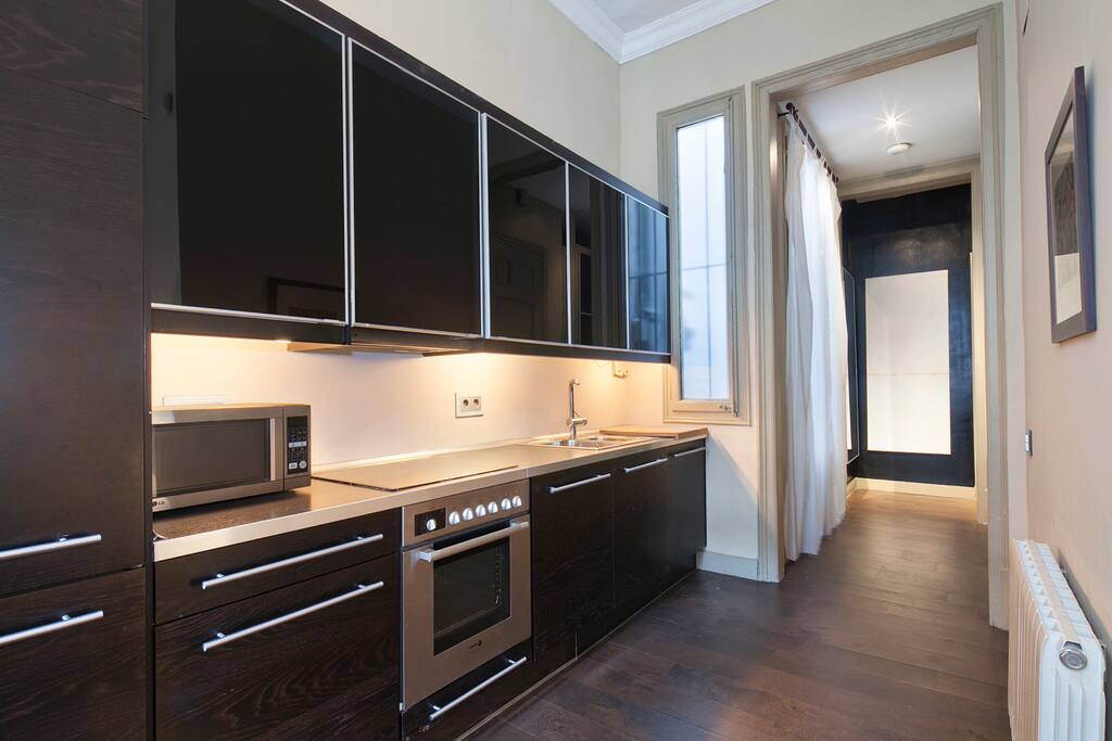 Dishes, oven, microwave, dishwasher, toaster, coffee maker and kettle available.