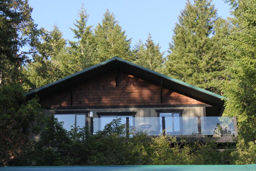 Treehouse is nestled in the treetops of Douglas Firs and Cedars overlooking Shawnigan Lake