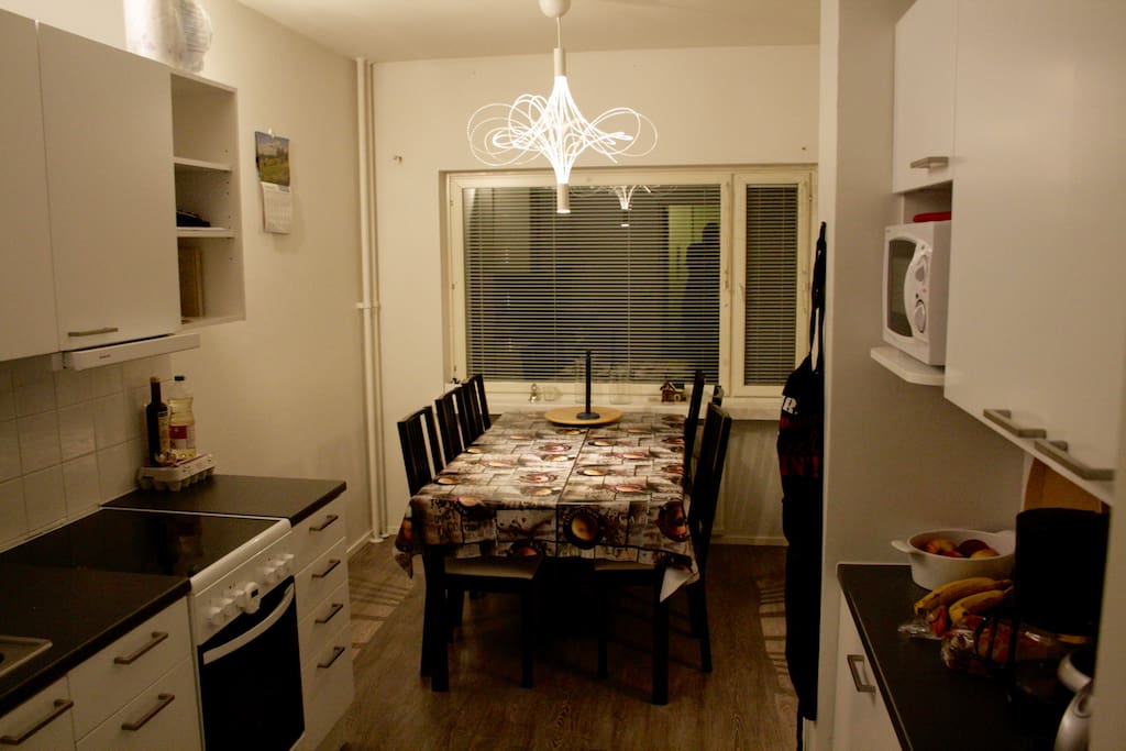 Kitchen. It's all you need. Table for 6, even 8, people. Oven, microwave oven, toaster, coffee maker, fridge, freezer etc.