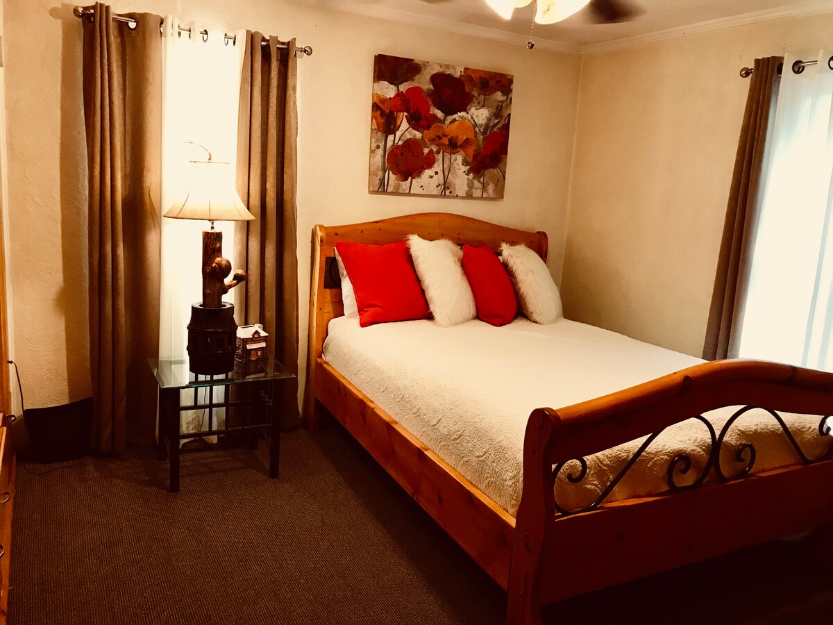 Master bedroom with queen bed