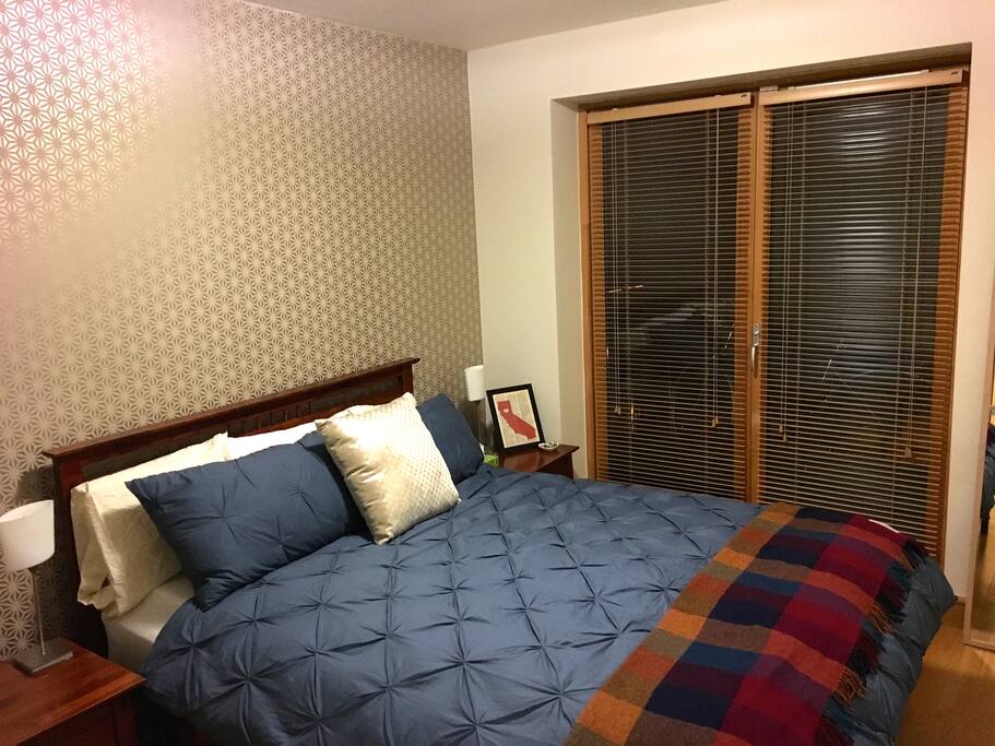 Bedroom - European King bed with balcony access