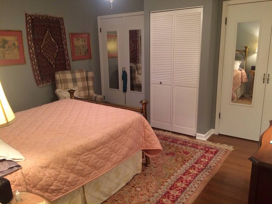 Master bedroom's two closets with washer and dryer in between