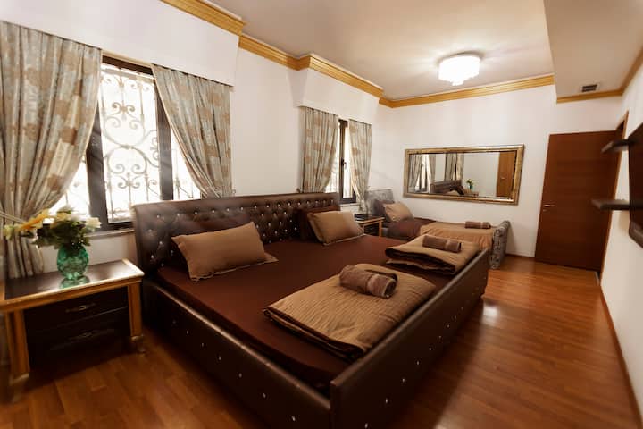 Second floor / room no. 2 • an extra large double bed and a single bed • for four people • balcony • TV • air conditioner 