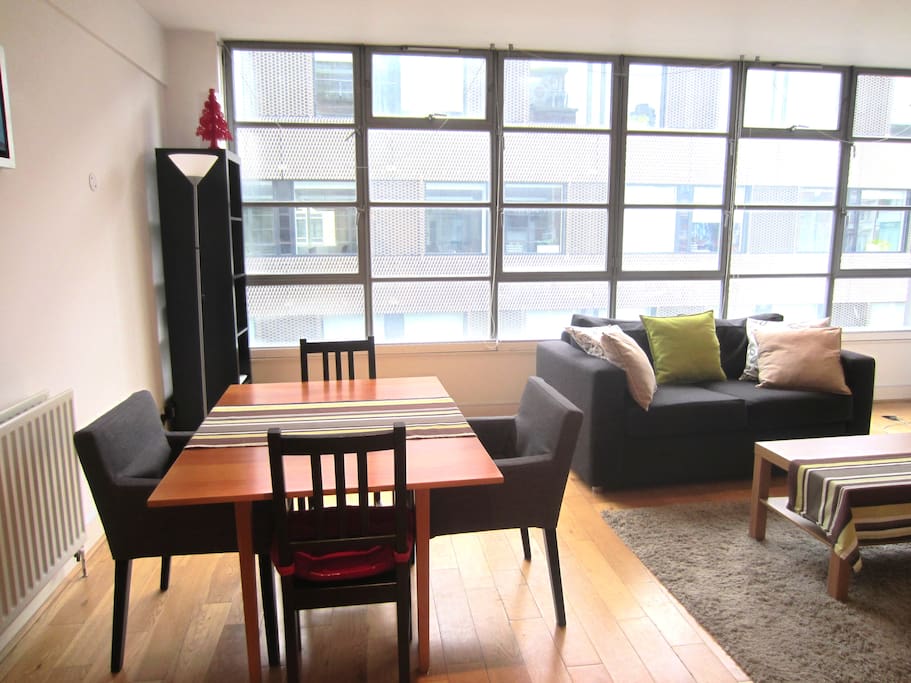 Spacious Reception Room with a dining table