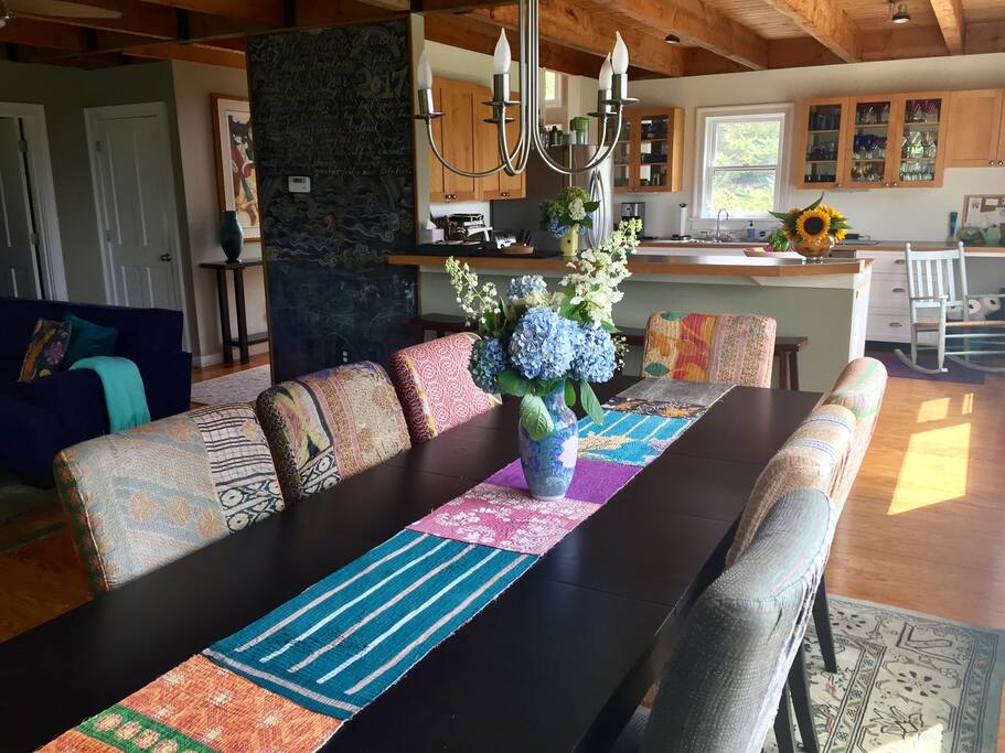 Dining room looking into kitchen. Great view from picture windows.