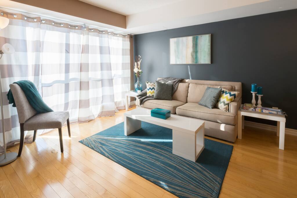 The living room is spacious and comfortable