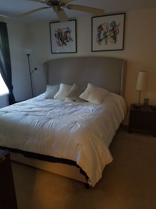 Master Bedroom - New Luxury King Bed 2 months old with view of pool area