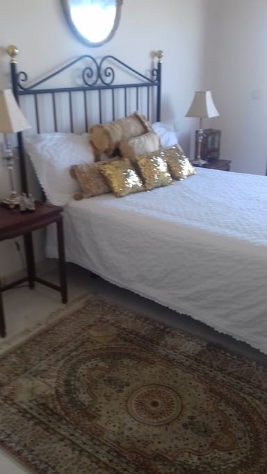 Bedroom 1 with marble ensuite small balcony mountain and sea view