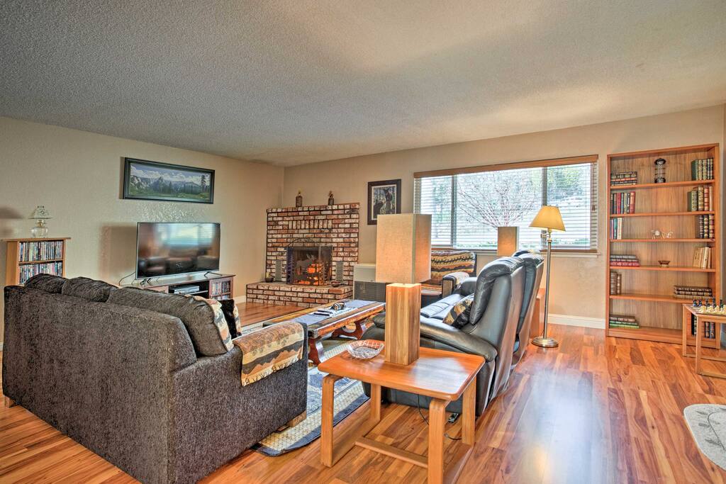 Spend time with loved ones in the living room with plush couches and a flat screen TV.