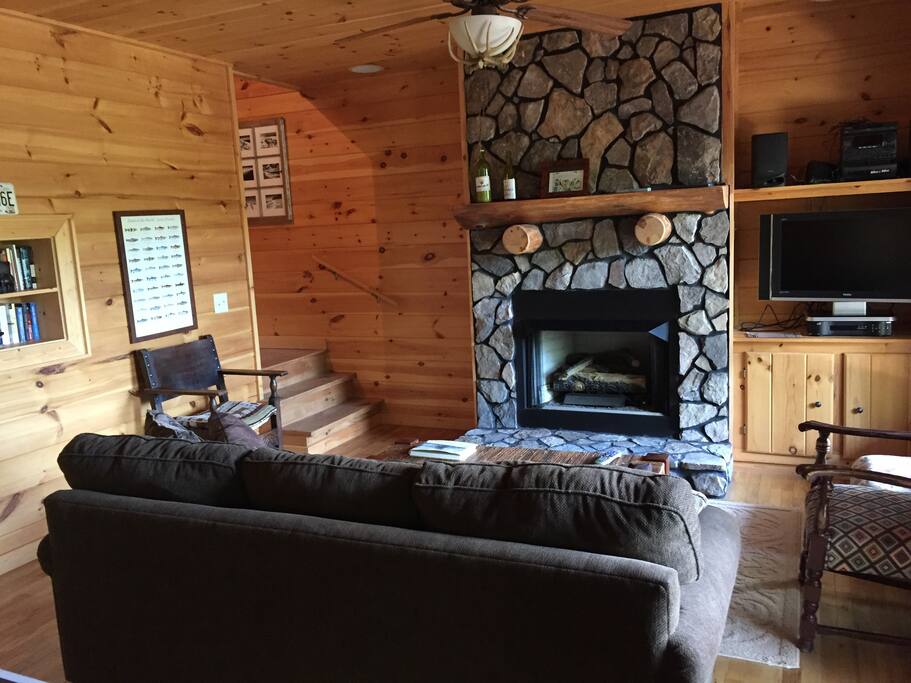 Lower level with gas log fireplace, sofa bed