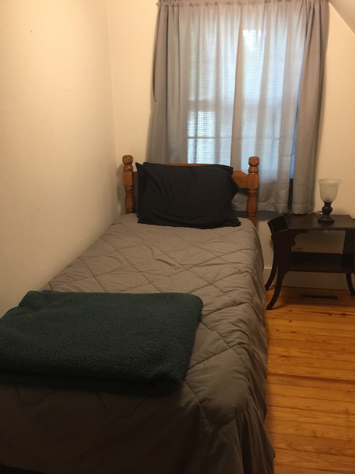 Twin bed tiny room