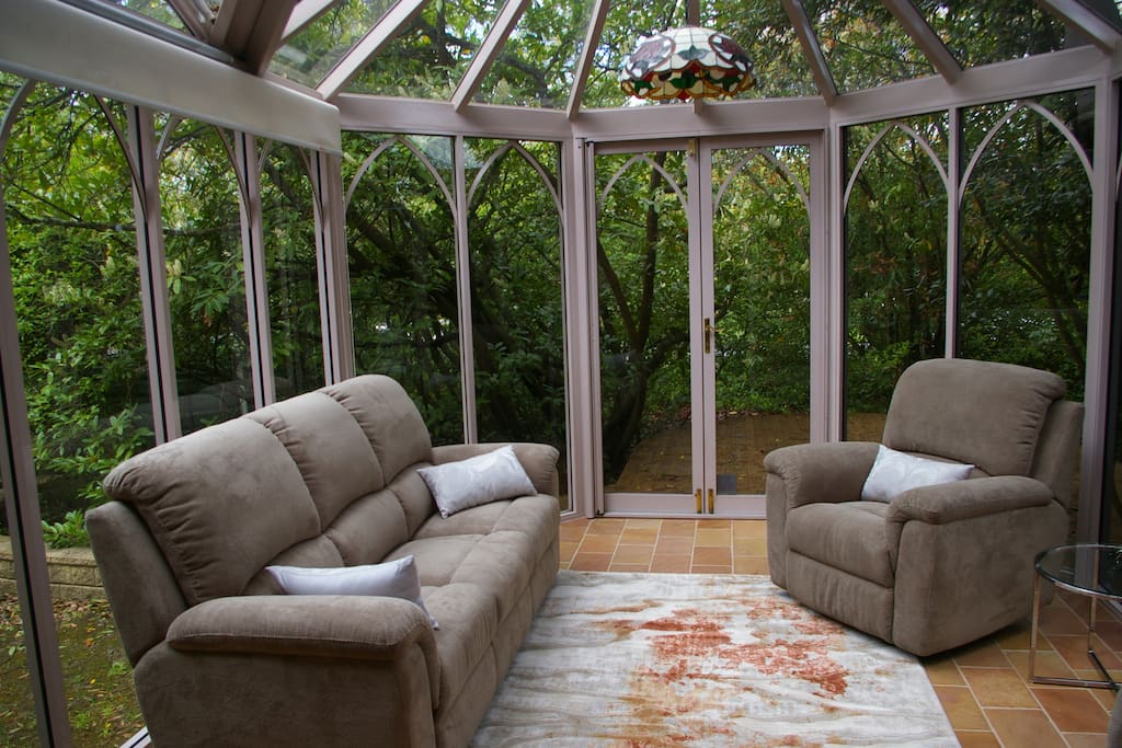 Large conservatory adjoins the building.