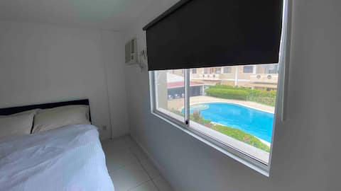 2 bedroom condo near tourist spots w/ Pool Access