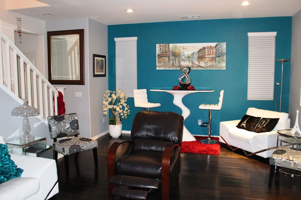 Other side of living room showing modern Italian furniture and décor.