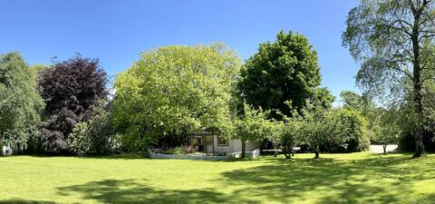 Delightful 2 bed chalet with patio in large garden