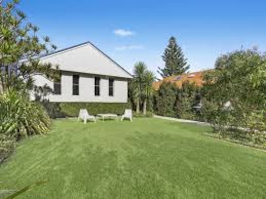 Private frontage with front garden and locked gate