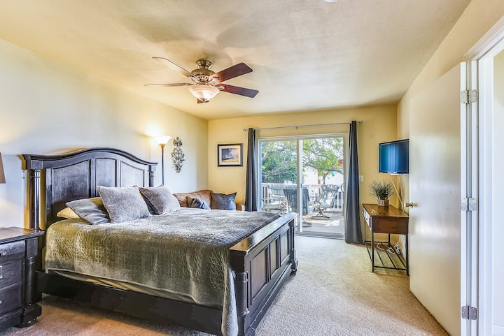 Master bedroom with private bathroom and pull out love seat
