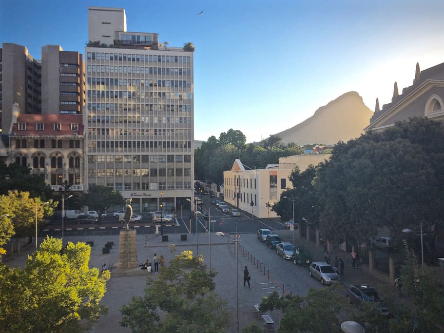View of the apartment block, the Slave Lodge and Lion's Head mountain from across Church Square