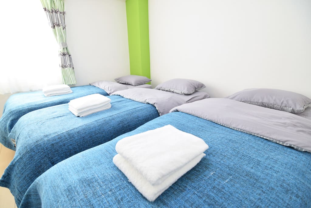 Bed Room 2 with 3 single beds.