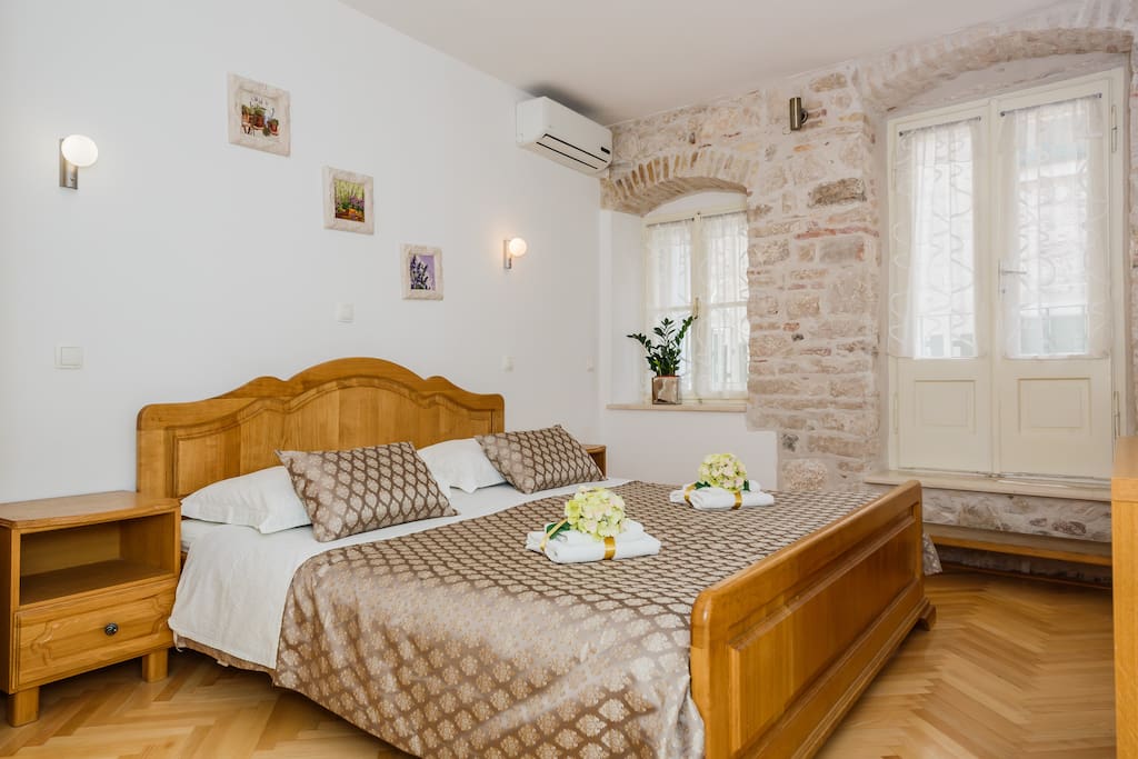double bedroom with small balcony