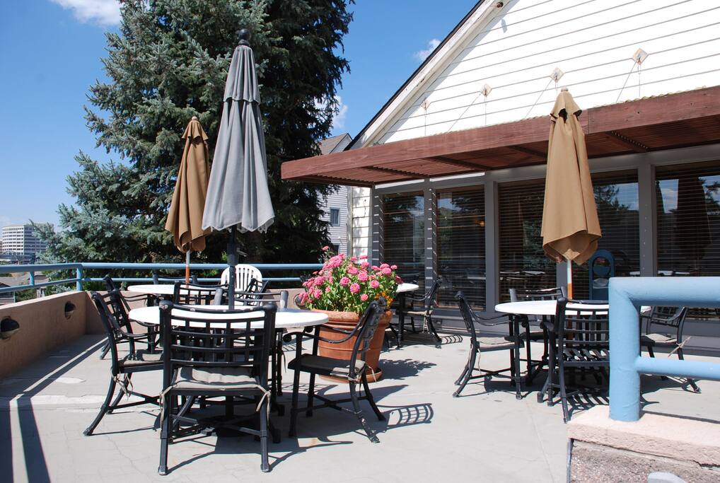 Outdoor patio with a gas grill overlooks the pool. Wonderful for grilling, spending times outdoor, or relaxing and reading a book.