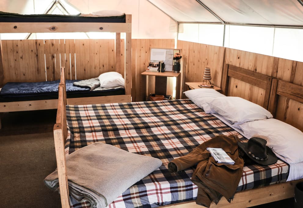Queen bed and bunk beds.