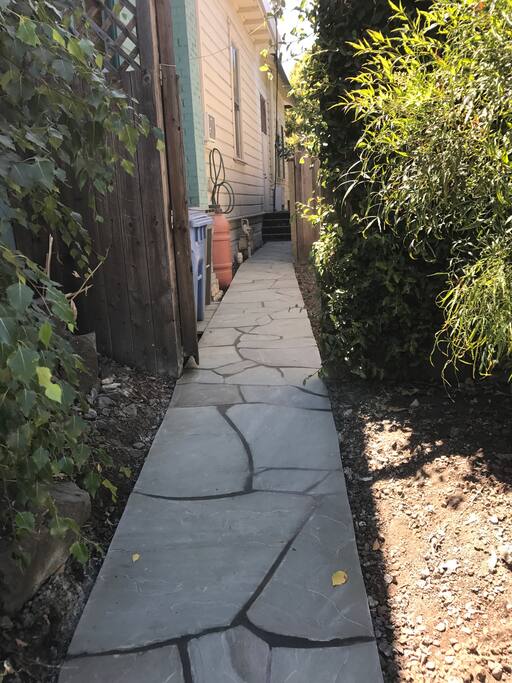 You have your own private entrance. Stone walk is stroller and roller bag accessible. 4 steps to the door.