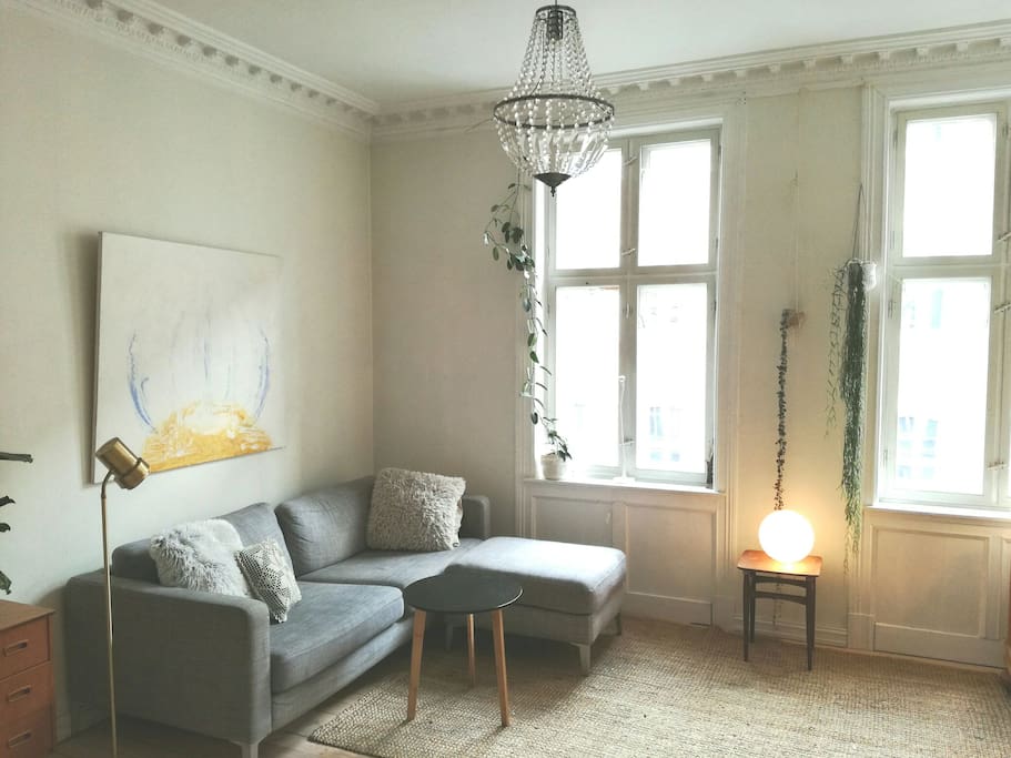 Spacious, light livingroom with a lot of charm.