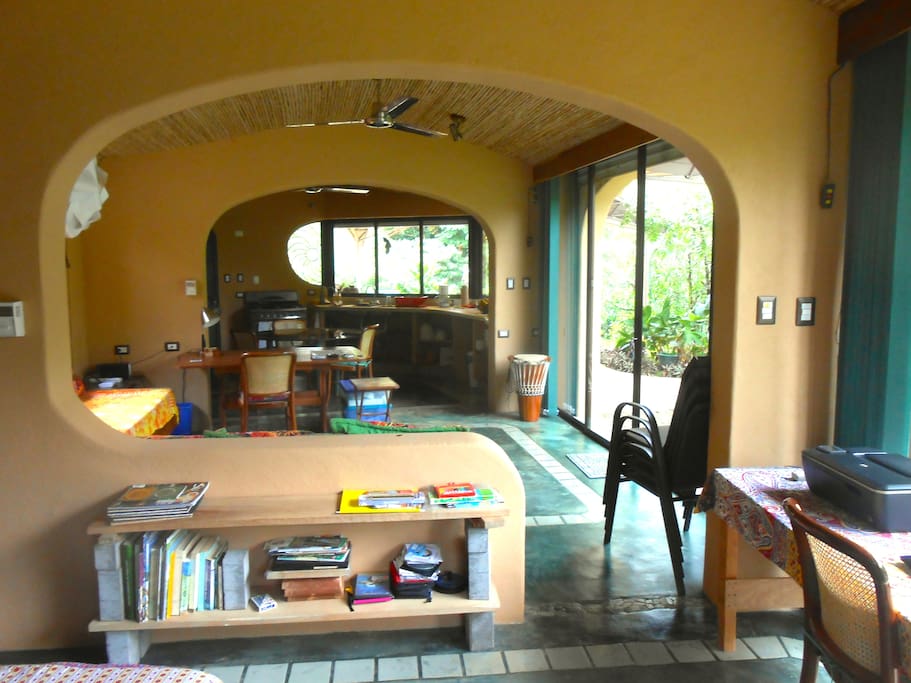 The three main spaces; bedroom, living room, dining/kitchen area.
