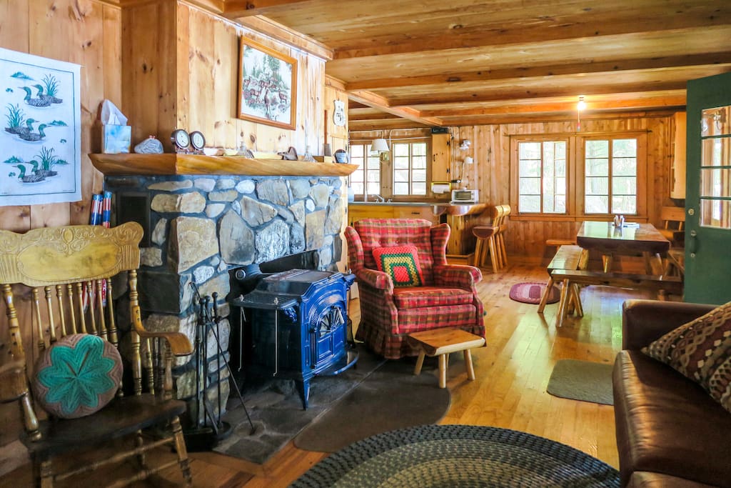 Cozy cabin with wood burning stove.