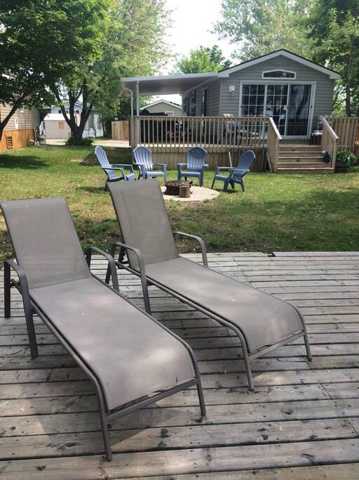 View of the cottage from the deck near the water.