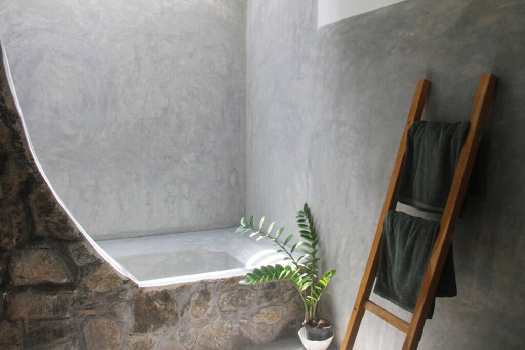 Solar hot water semi-open air shower/bath