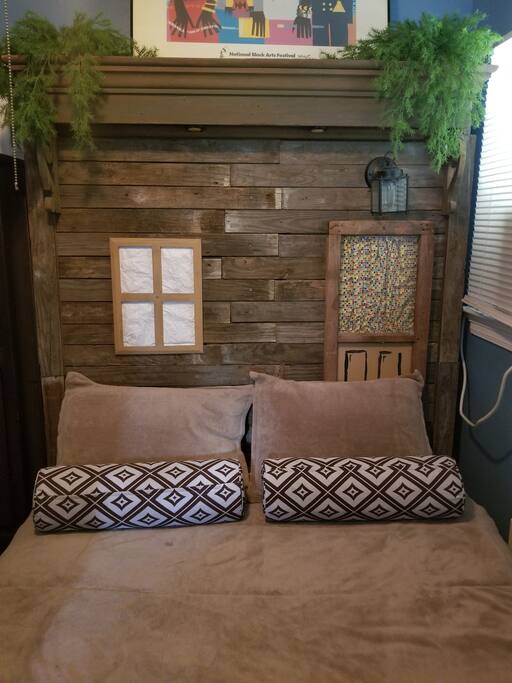 Handmade bed to model a traditional New Orleans Shotgun House