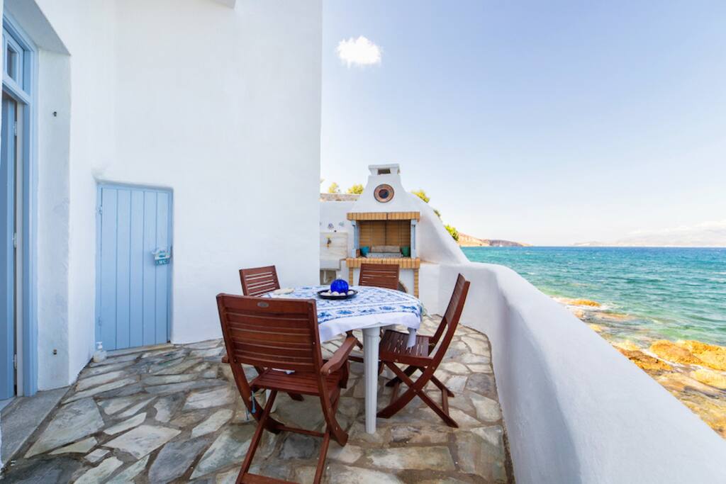 Ground floor veranda with dining area and BBQ